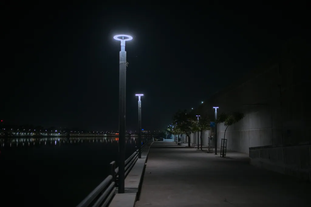 Ring post tops along the riverfront promenade at night, Ahmedabad