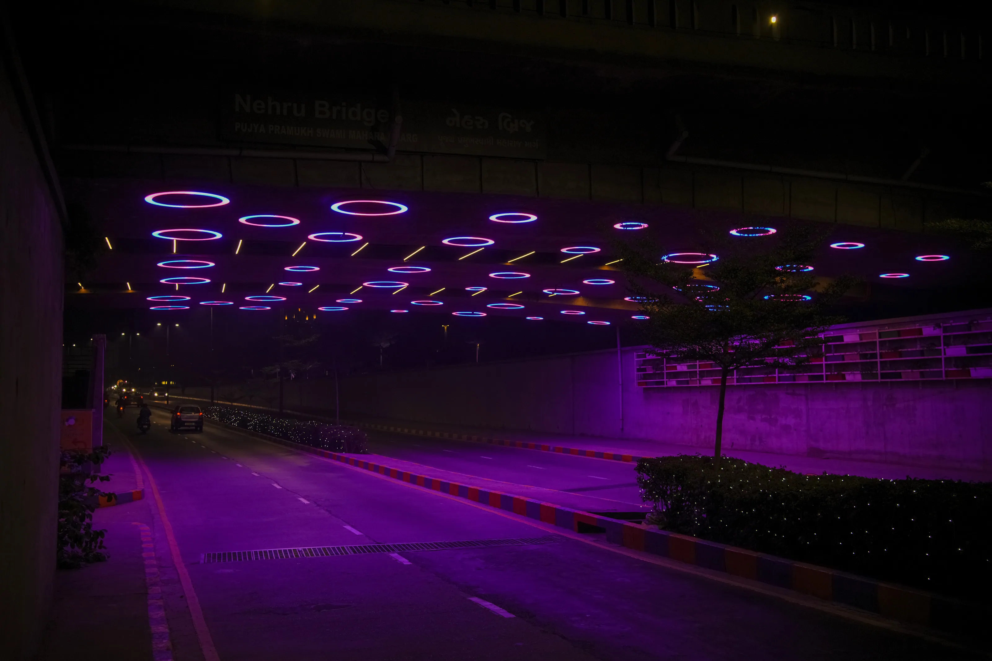 The road beneath Nehru Bridge after dark.