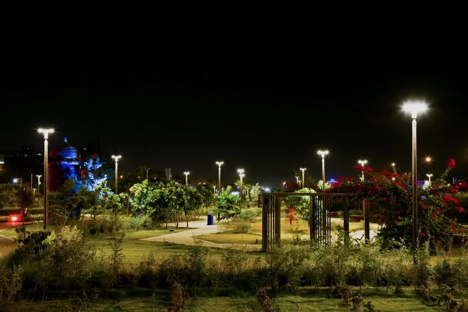 Post tops across the lawns and planting of the Flower Garden on the Sabarmati Riverfront at night