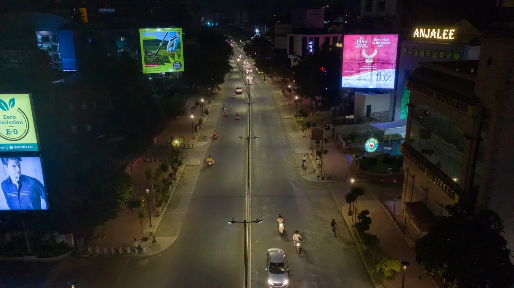 C.G. Road in Ahmedabad from above at night, lit by street lights along the median