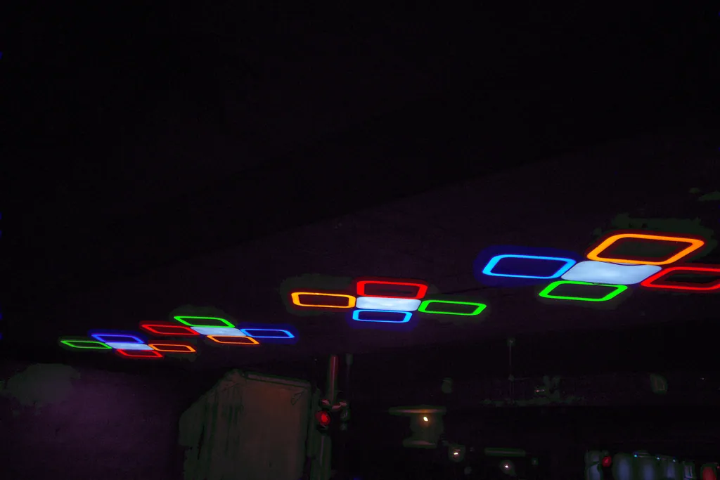 Cluster lights in yellow, red, green and blue on the dark soffit